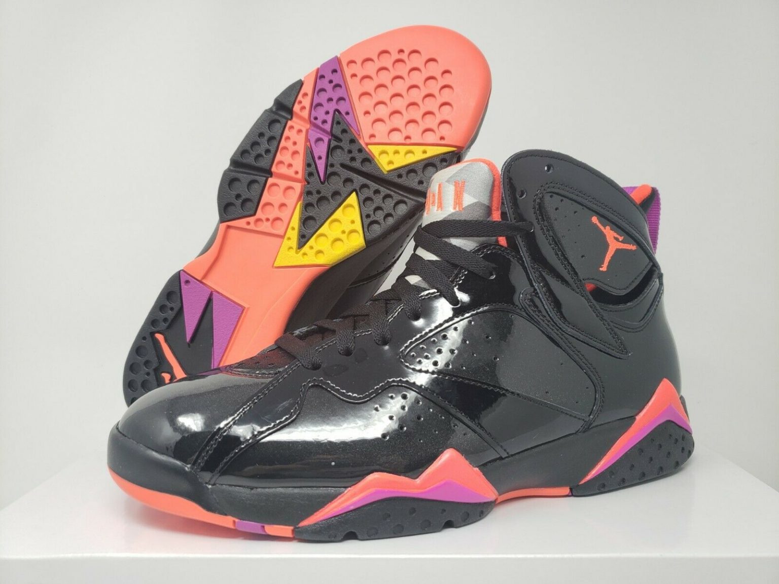 black and pink retro 7 jordans